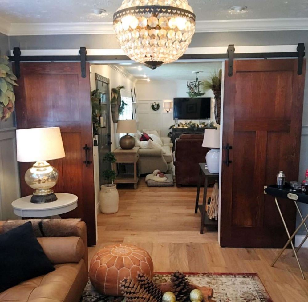 Barn doors between a living room and office
