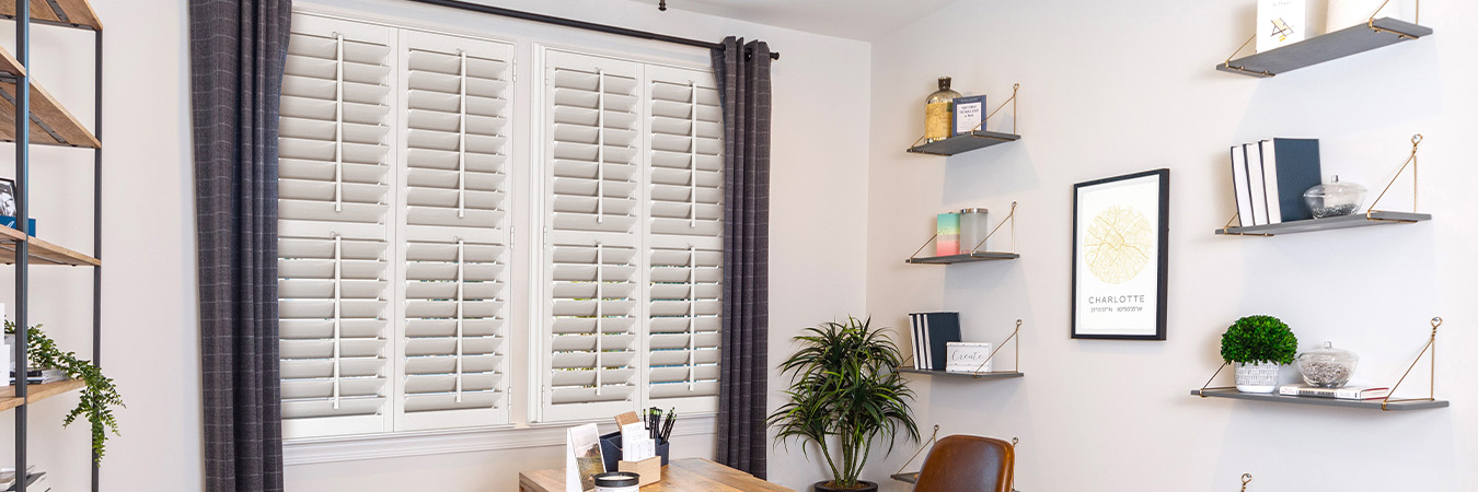 White Polywood shutters in a modern style office